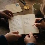 Parrain et filleul : carnet manuscrit et écriture